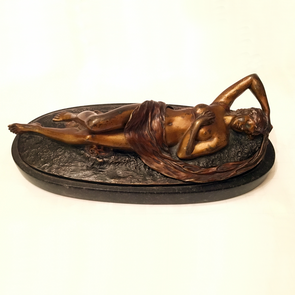 A reclining Austrian cold bronze of a maiden