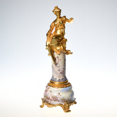 A Vienna Enamel  gilt figure on decorated stand