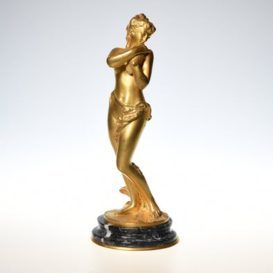 An antique bronze figure of a nude girl with Dove - Antique and Interior Innovations